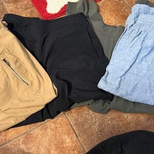 Four pair at Assorted Skirts in Black, Tan, and Blue